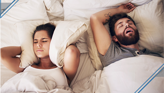 snoring man keeping wife awake