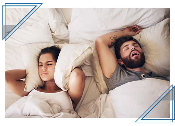 snoring man keeping wife awake