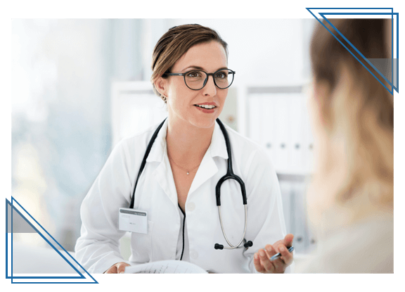 woman talking to female doctor